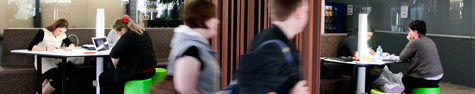students on nathan campus sitting in a common area